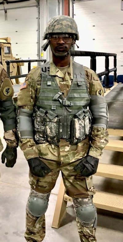 Yacouba Sibi in U.S. Army field gear during a training exercise